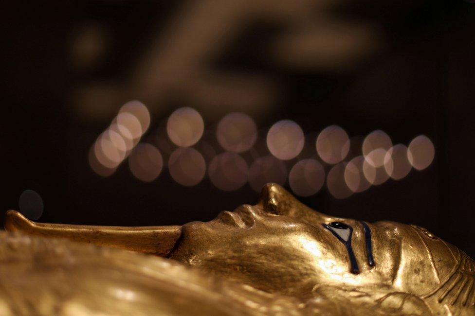 A golden sarcophagus is displayed at the National Museum of Egyptian Civilization after its reopening in Cairo, Egypt, 5 April 2021.