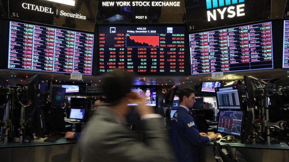 Traders at New York Stock Exchange 7 December 2018