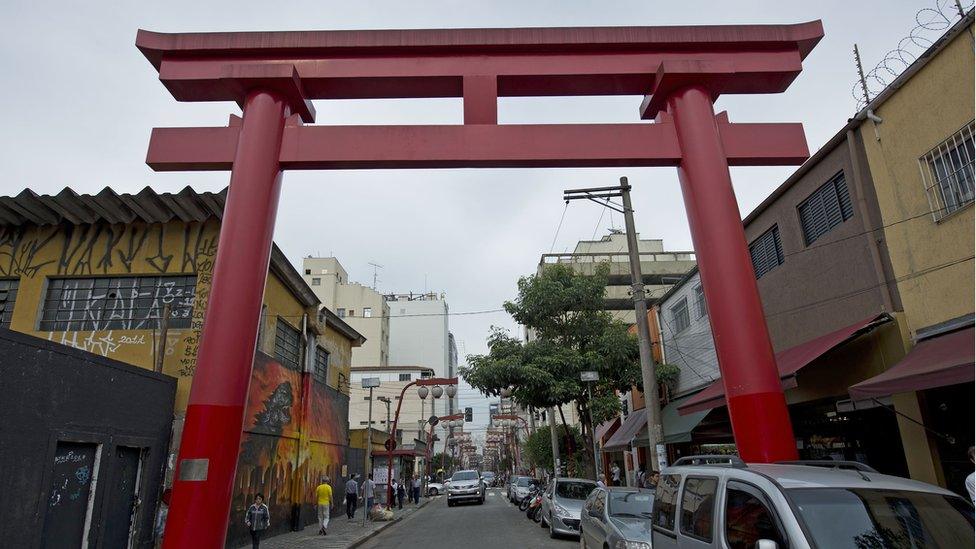 Women are seen at Liberdade, a central Sao Paulo neighbourhood with a high concentration of Japanese descendants, on June 14, 2014.