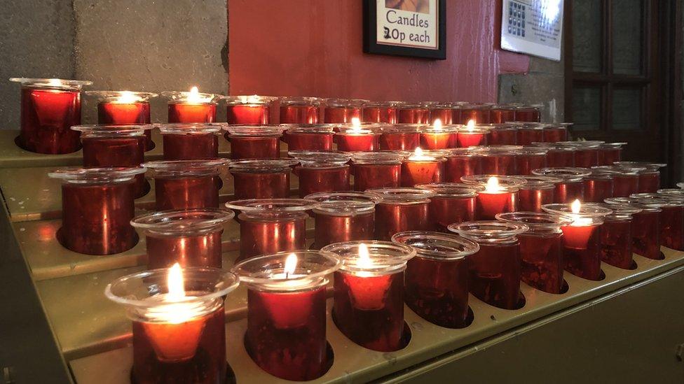 Candles lit in Church of the Immaculate Conception in Strabane