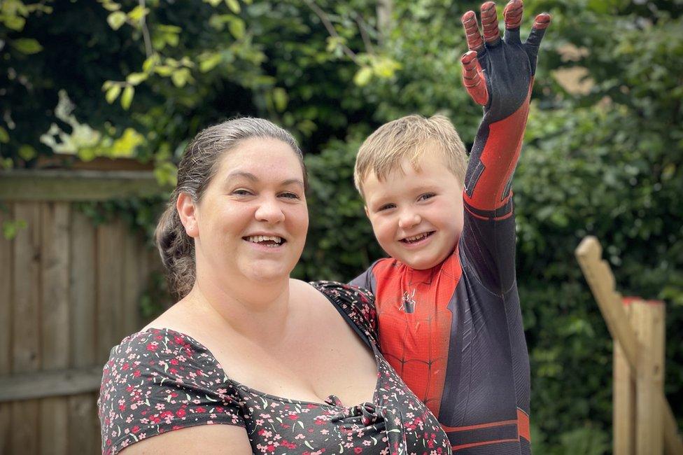 Kimberley Allison with son Logan who is wearing a Spiderman outfit