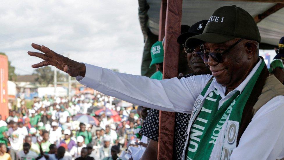 Joseph Boakai waving to the public during his campaigning tour