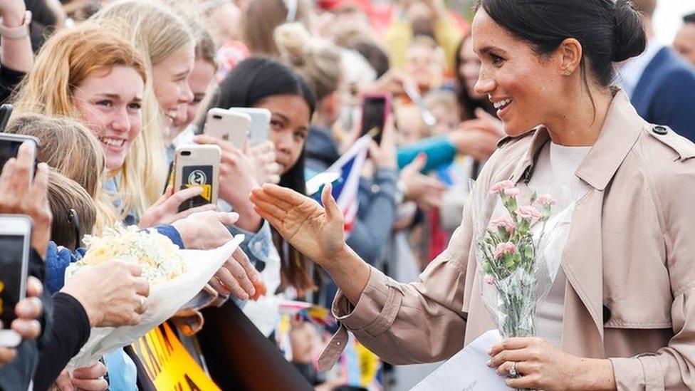 The Duchess of Sussex meets crowds during a walkabout in Auckland, New Zealand