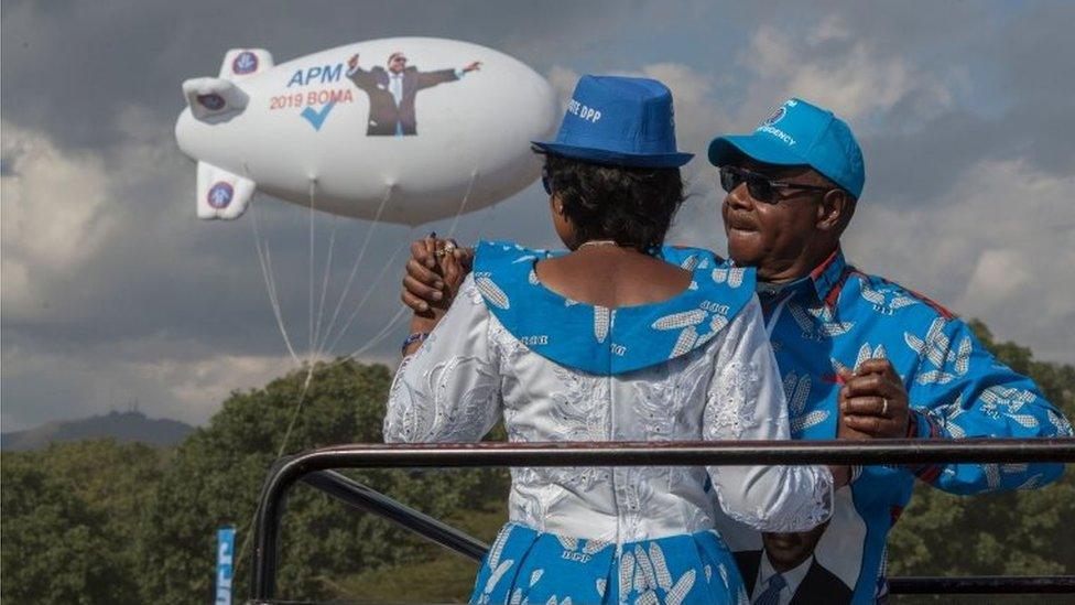 Malawi's President Peter Mutharika dances with First lady Getrude Mutharika