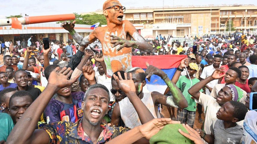 Supporters of Niger's National Council for the Safeguard of the Homeland (CNSP) demonstrate in Niamey on August 6, 2023