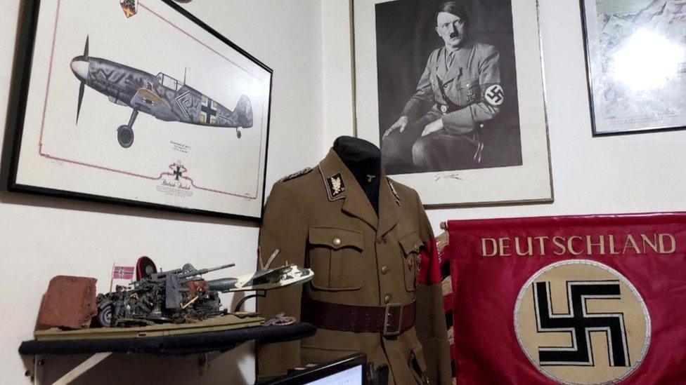 Nazi objects are seen in a home of an alleged paedophile in Rio de Janeiro