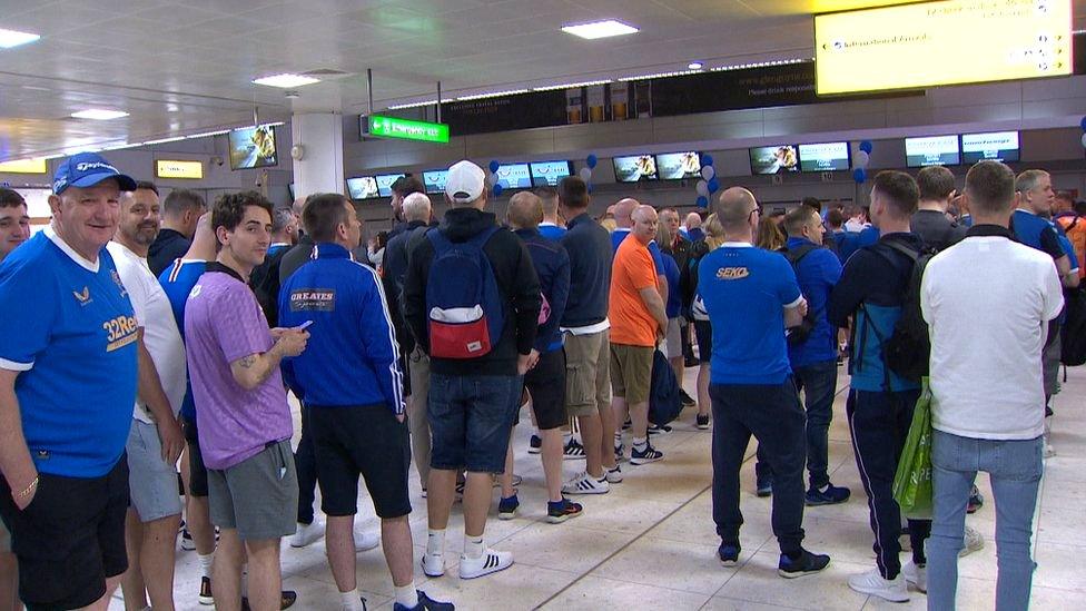 rangers fans at Glasgow Airport