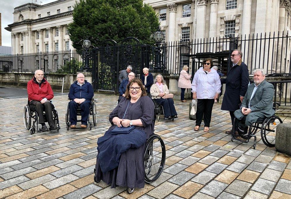 Jennifer McNern (centre) outside Belfast High Court