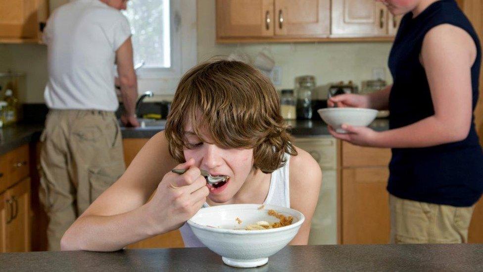 Boys having breakfast