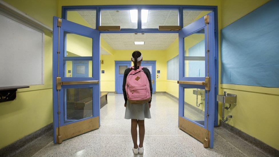 Child in corridor.