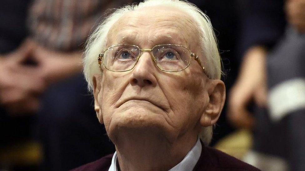 Oskar Groening listens to the verdict at his trial in Lueneburg