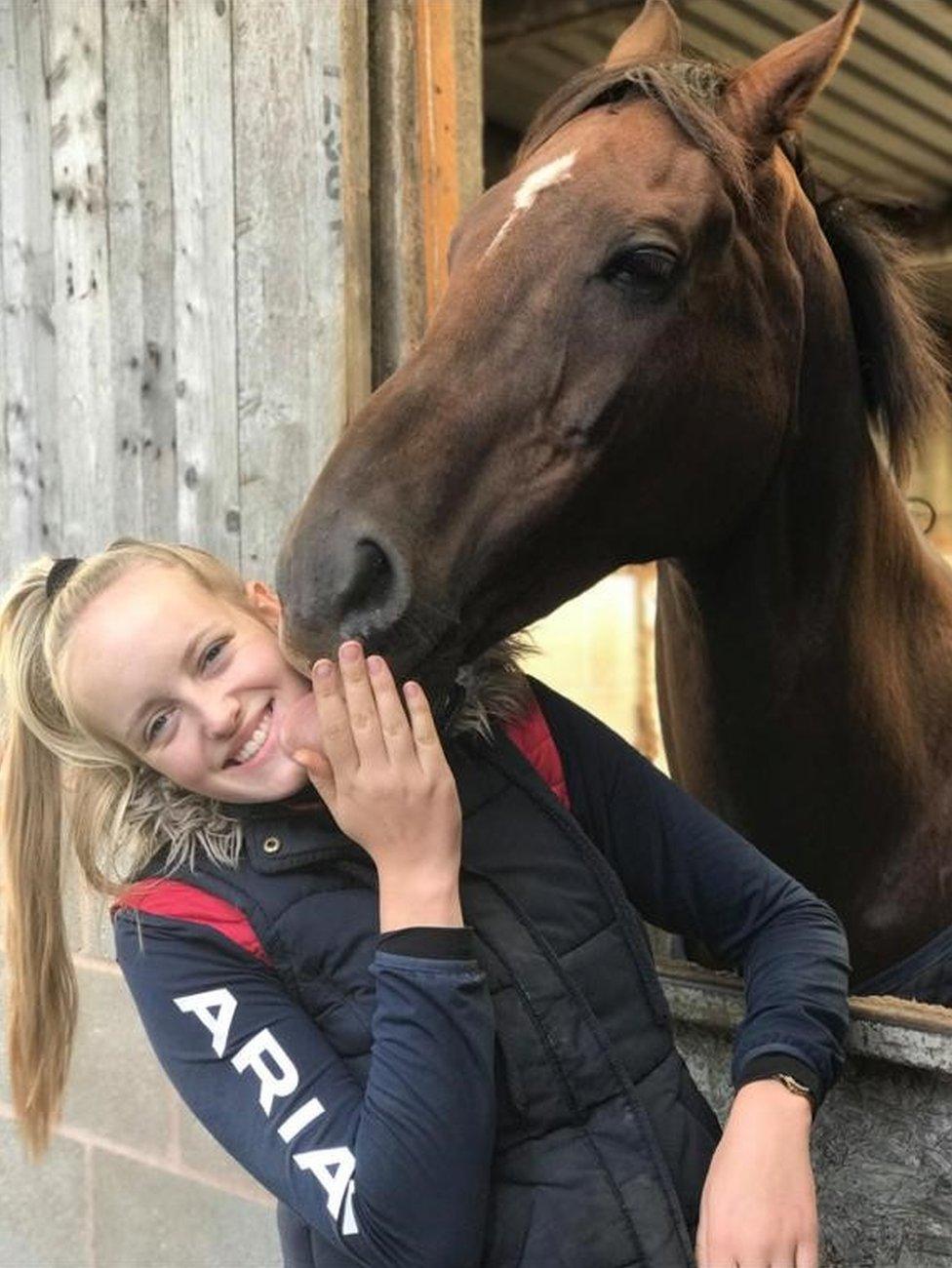 Gracie with her horse