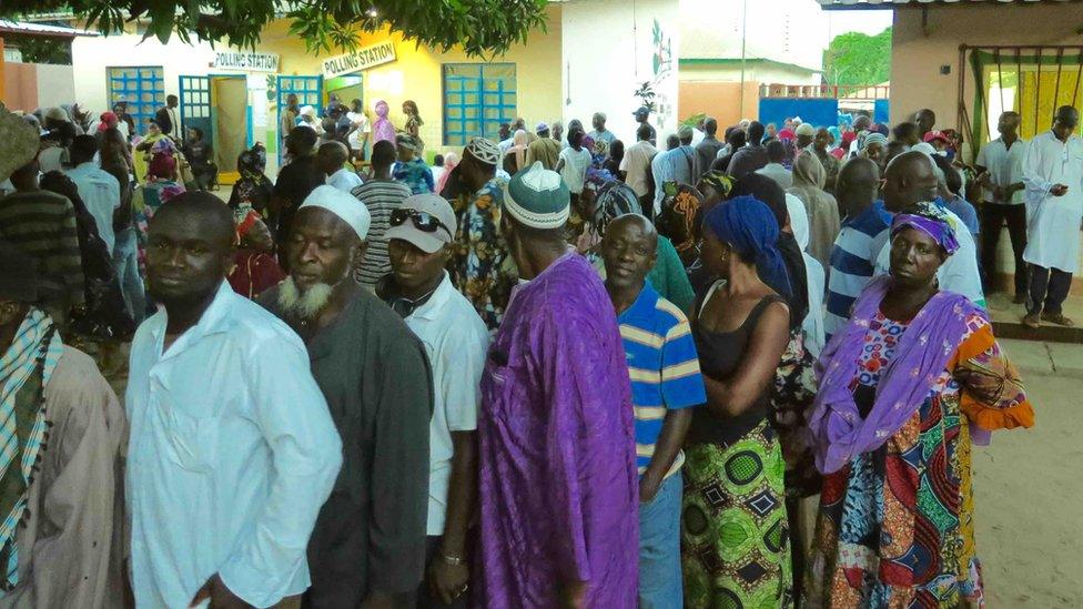 Voters queuing up at a polling station in The Gambia