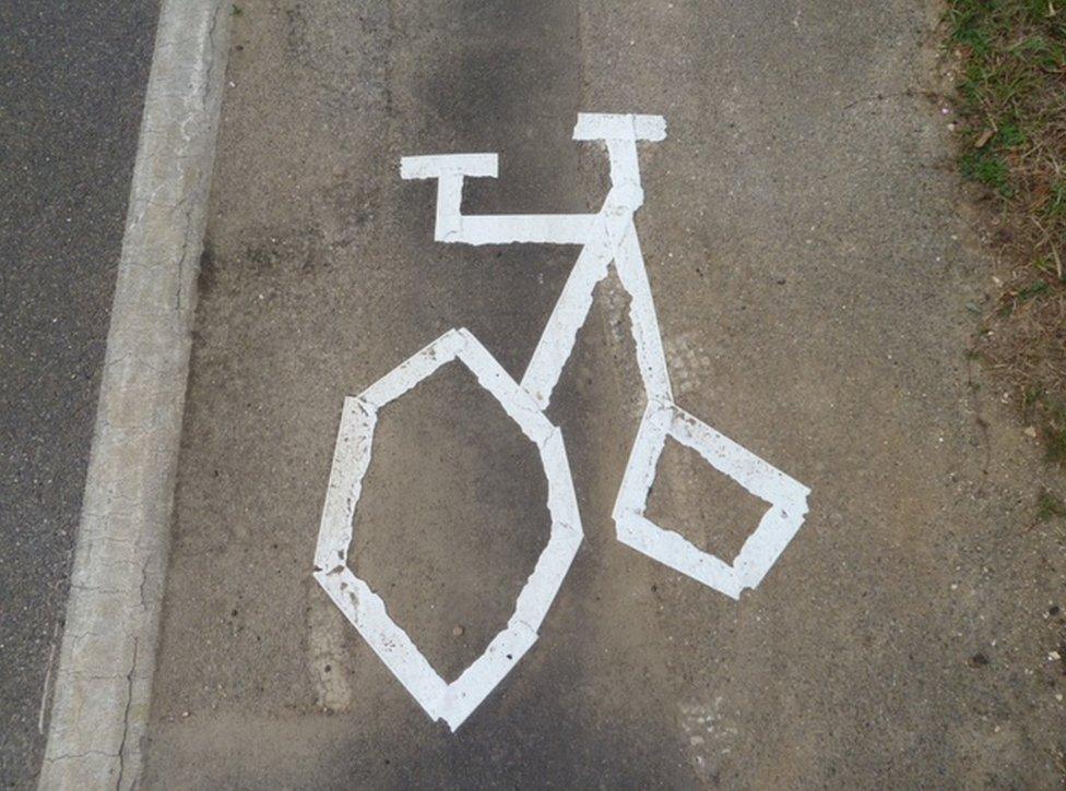 Crooked marking of a bike on a cycle path