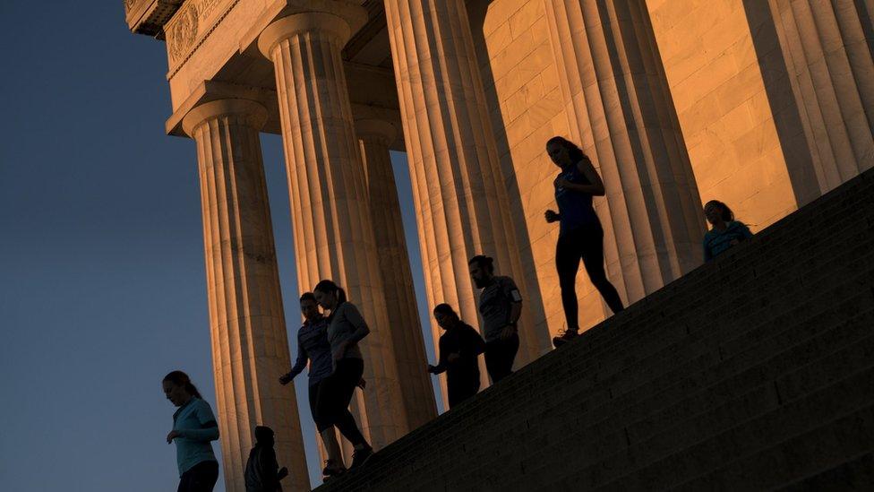 People exercise by running the steps at the Lincoln Mmeorial on November 11, 2015 in Washington, DC