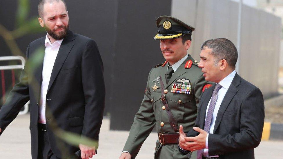 Prince Hamzah bin al-Hussein (C) with princes Hashem bin al-Hussein (L) and Rashed bin al-Hassan (R) arrive at the opening of a military exhibition in the Jordanian capital Amman in May 2018