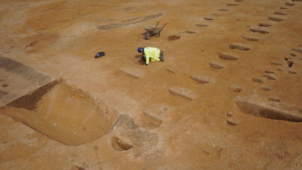 Archaeologists dig at the settlement