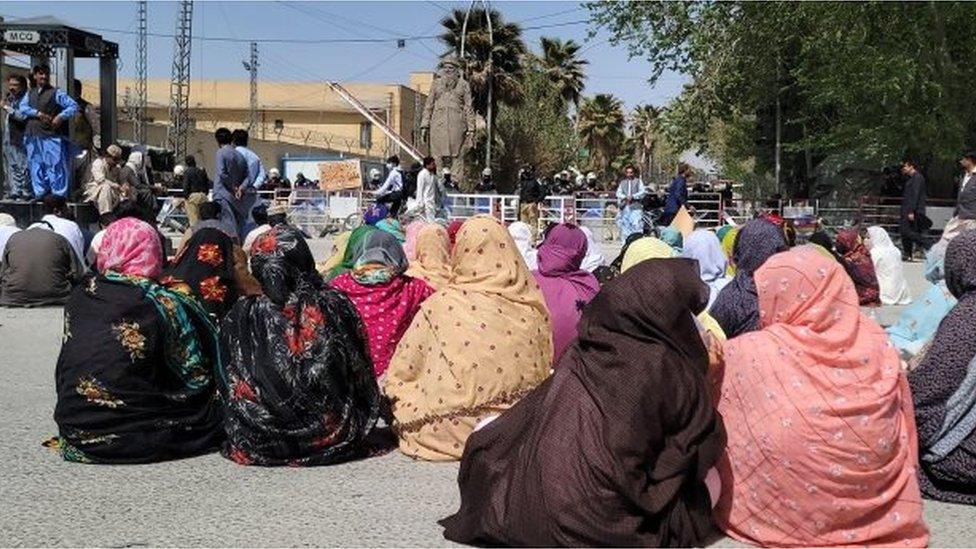 Government employees gather near the Governor"s office during a protest against inflation demanding increment in their salaries, in Quetta, Pakistan, 24 March 2022.