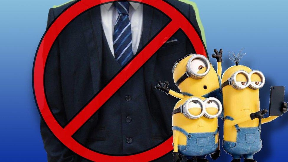 A suit with a banned sign and Minions in the foreground.