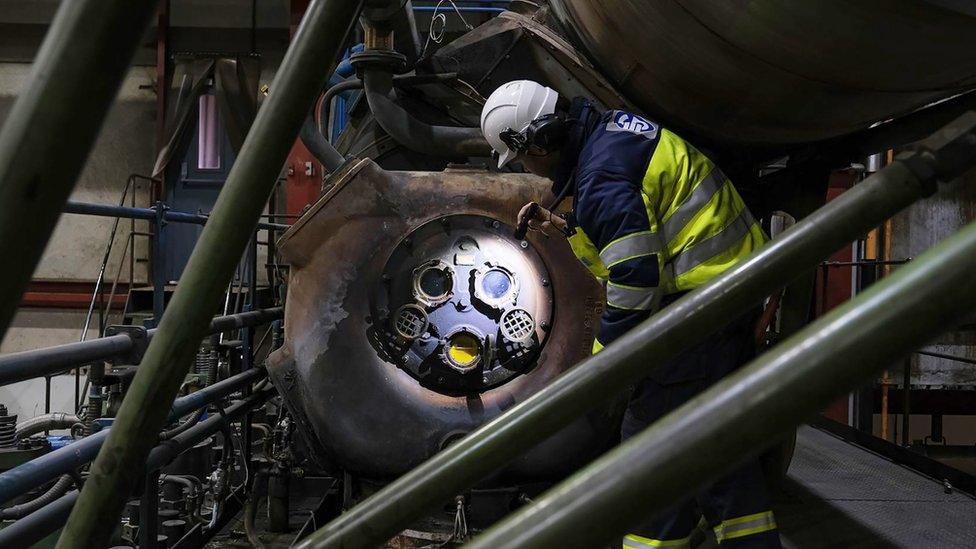 A man performing a routine maintenance checks on one of the Sulzer 9RNF68 generators at the power station in Guernsey