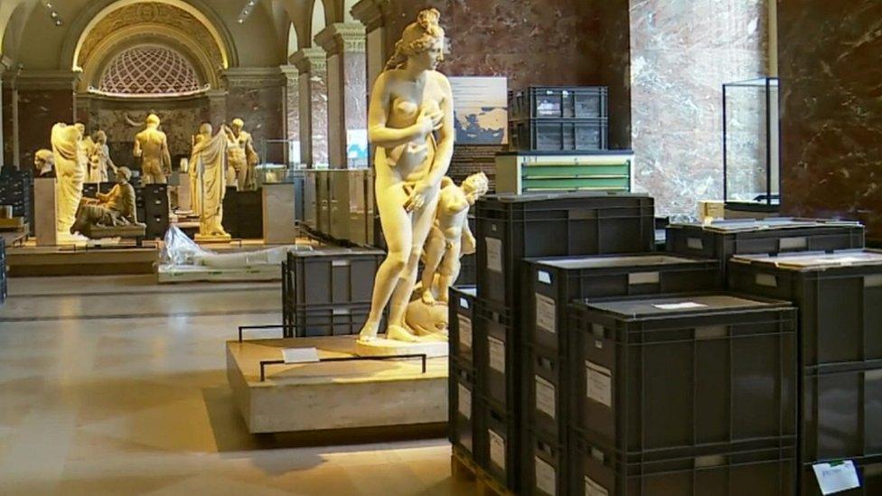 Boxes around statues in the Louvre