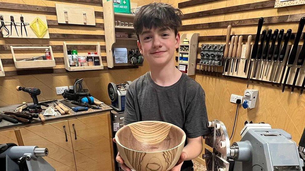 boy-holding-bowl.