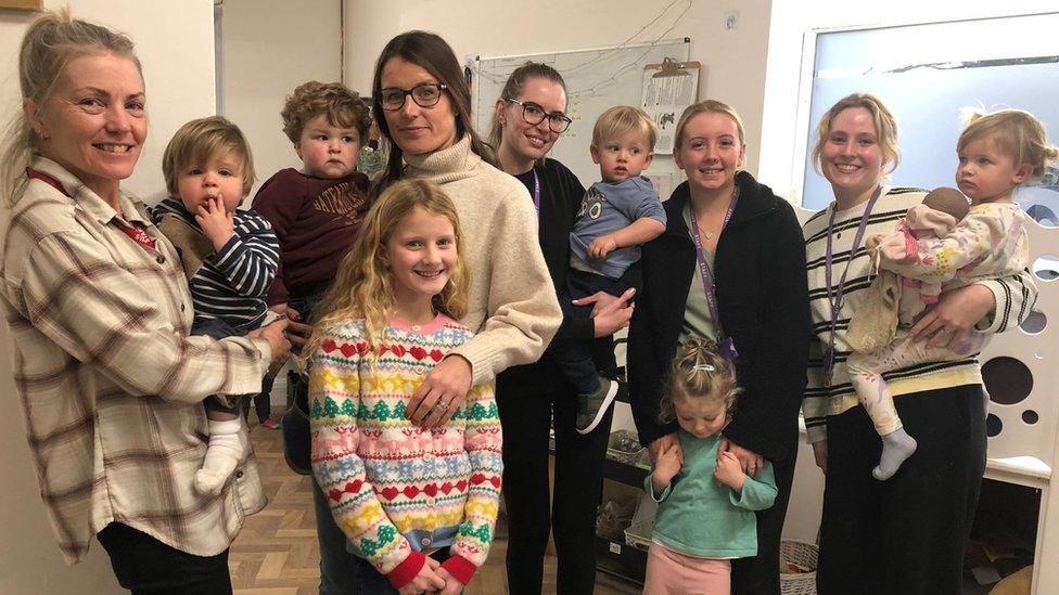 Staff and children at the nursery