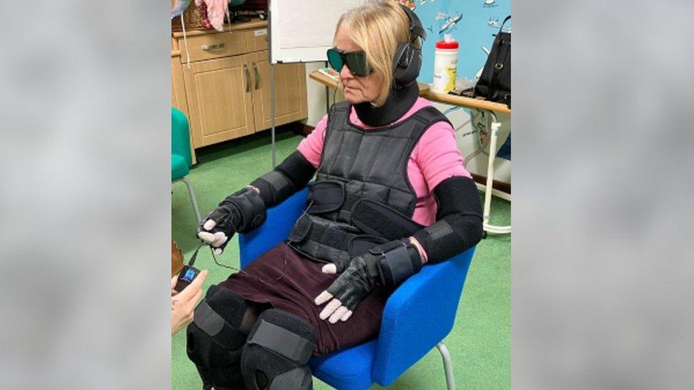 A woman in a dementia suit