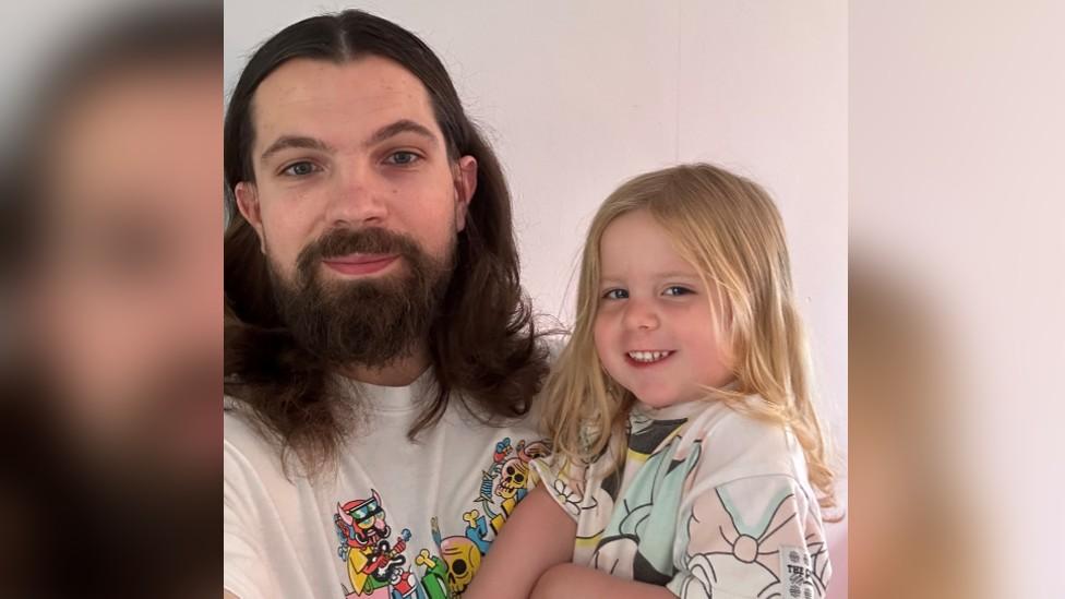 Alex Cole with his daughter Violet