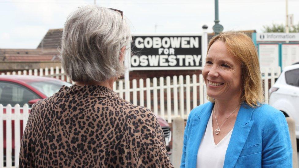 Helen Morgan speaking to resident in Oswestry