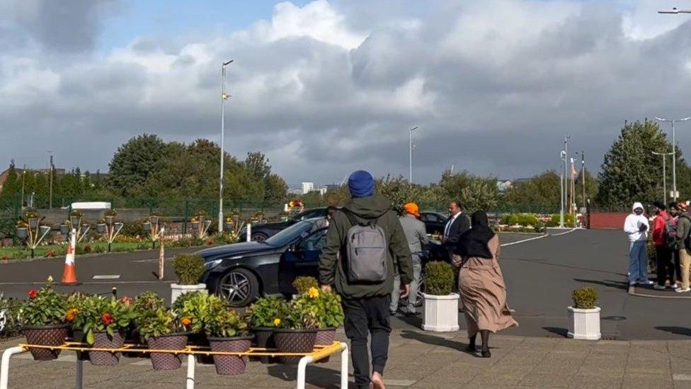 activists approach car