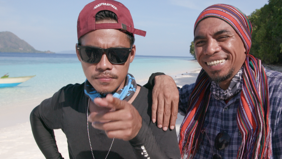 Ronald and Iskandar pose together during a beach trip