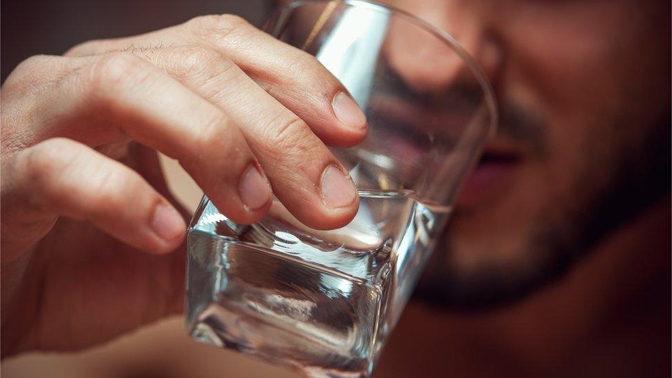 Man drinking vodka