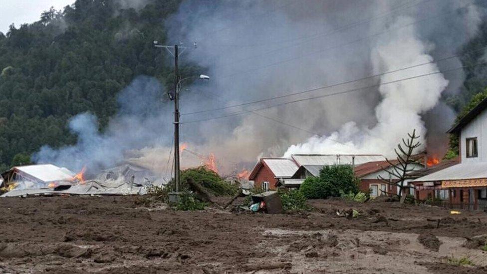 This handout photo released by Rescate Chaiten shows part of the town of Villa Santa Lucia near Chaiten in southern Chile that was devastated by a landslide that left five dead and 15 missing on December 16, 2017,