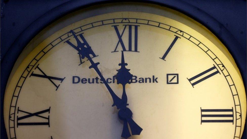 clock and Deutsche logo