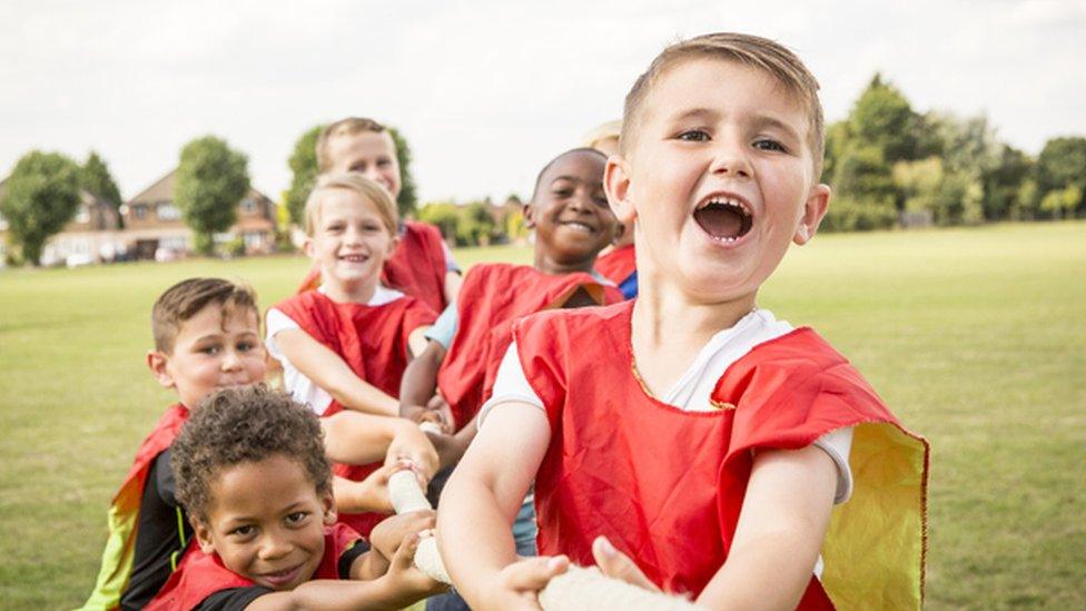 Children playing tug of war