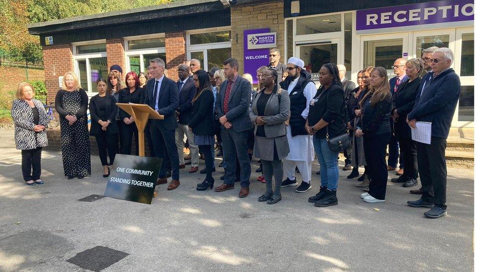 Andrew Fell with community leaders and school staff at North Huddersfield Trust School