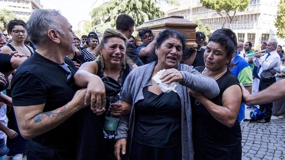 People attend the funeral procession of alleged mafia member Vittorio Casamonica, outside Don Bosco church in Rome, Italy, 20 August 2015