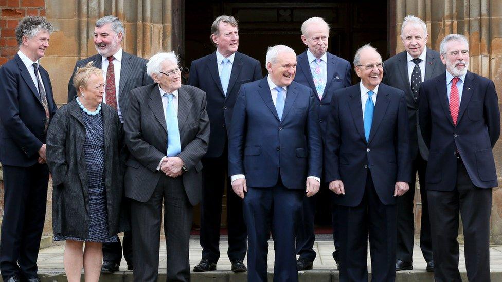 Members of the 'Class of 1998' posed for photos outside Queen's University