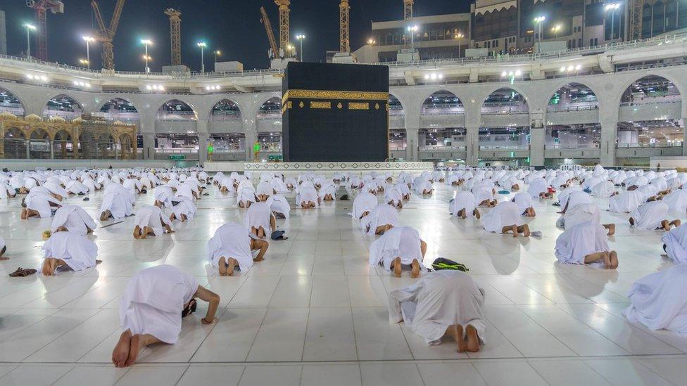 Muslims keep a safe social distance while performing Umrah at the Grand Mosque on 1 November 2020