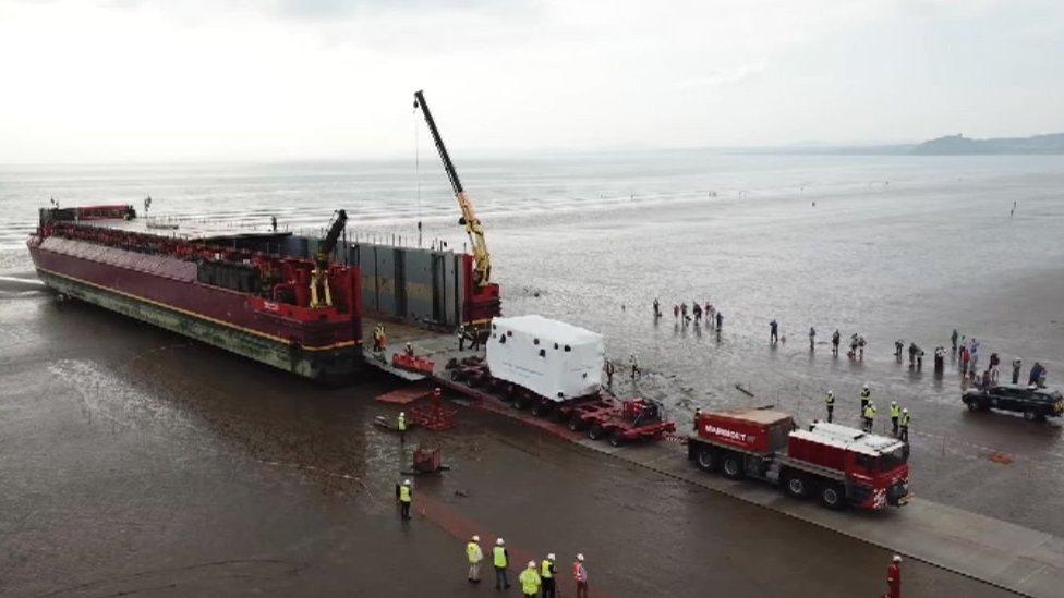 transformer being unloaded