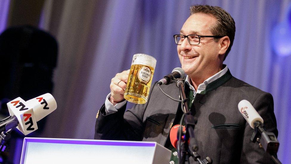 Heinz-Christian Strache, Austrian Vice-Chancellor and leader of the Austrian Freedom Party FPOe, holds a beer mug as he delivers a speech in Ried, Austria on 14 February 2018.