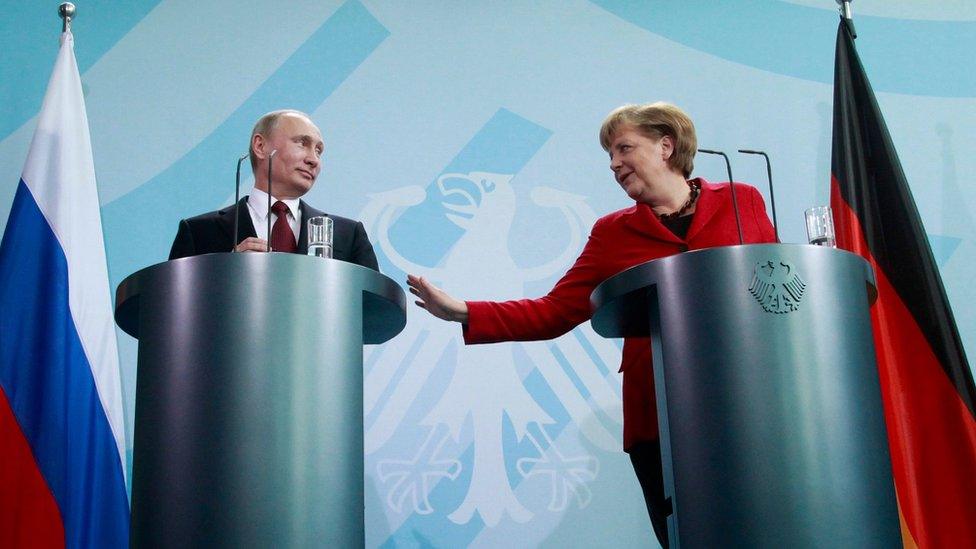 Russian President Vladimir Putin and the German Chancellor Angela Merkel