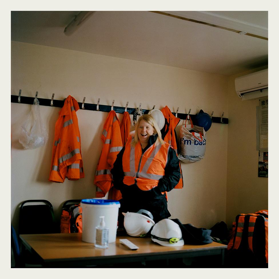 Heather Waugh laughs with colleagues in the works mess room