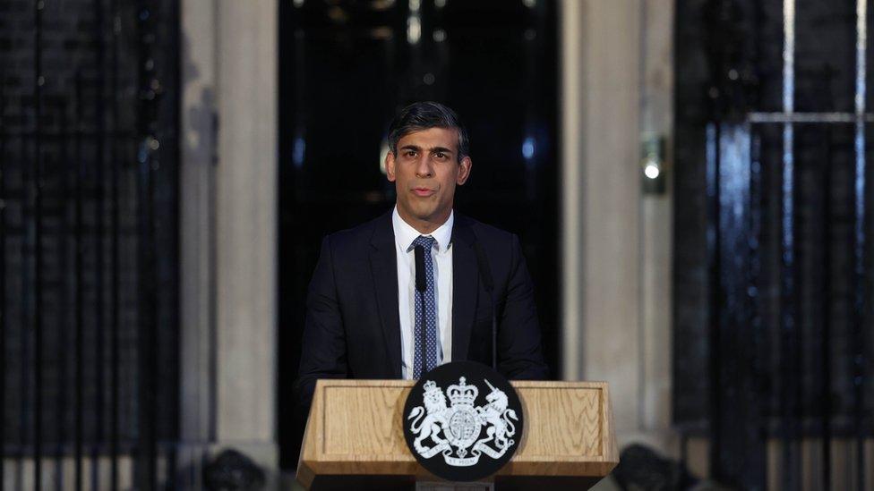 Rishi Sunak standing at a lectern outside 10 Downing Street