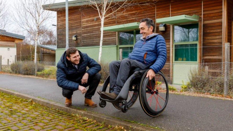 Andrew Slorance tests out his winning Phoenix i wheelchair