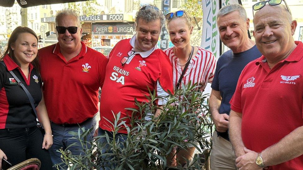 Kevin Davies (right), the father of Wales player Gareth Davies, with friends