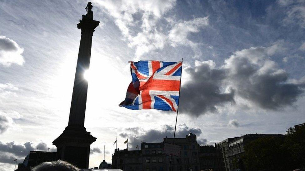 Union Jack held up in Trafalgar Square