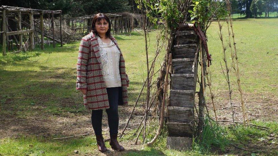 Minerva Castañeda poses for a photo