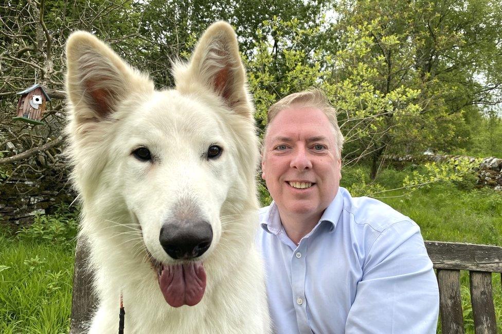 George Greer with his dog, Noah